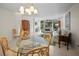 Spacious living room with dining area, comfortable seating, and natural light at 4530 Pinebrook Cir # 109, Bradenton, FL 34209