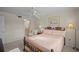 Main bedroom with large windows and comfortable furnishings at 4530 Pinebrook Cir # 109, Bradenton, FL 34209