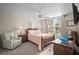 Serene main bedroom with a large window and elegant furnishings at 4530 Pinebrook Cir # 109, Bradenton, FL 34209