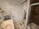 Bathroom featuring a vanity with a mirror, a tiled floor, and ample storage at 5301 Algeria Ct, Bradenton, FL 34207