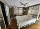 Comfortable bedroom with natural light, wood floors, and closet at 5301 Algeria Ct, Bradenton, FL 34207