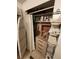 A storage closet with a variety of cleaning supplies and textiles at 5301 Algeria Ct, Bradenton, FL 34207