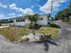 Attractive single-story home with a landscaped yard, showcasing a tranquil neighborhood setting at 5301 Algeria Ct, Bradenton, FL 34207