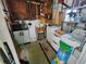 Spacious utility room featuring a washer, dryer, and ample storage solutions at 5301 Algeria Ct, Bradenton, FL 34207