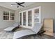 Relaxing patio with comfortable lounge chairs, offering a perfect spot for lounging and enjoying the outdoors at 5373 Anthony Ln, Sarasota, FL 34233