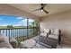 Relaxing balcony with outdoor seating and stunning views of the golf course and water at 5624 Palmer Cir # 206, Bradenton, FL 34211