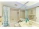 Bright bathroom featuring a shower-tub combo and a spacious vanity at 6108 7Th W Ave # 6108, Bradenton, FL 34209