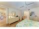 A bedroom view shows the light colored wood-look floors and three dressers at 6108 7Th W Ave # 6108, Bradenton, FL 34209