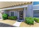 Charming condo entrance with landscaped garden and covered doorway at 6108 7Th W Ave # 6108, Bradenton, FL 34209