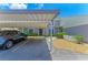 Exterior view with covered parking and landscaped grounds at 6108 7Th W Ave # 6108, Bradenton, FL 34209