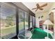 Enclosed lanai features views of the property's manicured landscaping at 6108 7Th W Ave # 6108, Bradenton, FL 34209