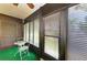 Enclosed lanai features views of the property's manicured landscaping at 6108 7Th W Ave # 6108, Bradenton, FL 34209
