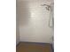 Modern bathroom shower featuring subway tile and updated fixtures at 669 Spanish N Dr # 21, Longboat Key, FL 34228