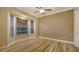 This bedroom features luxury vinyl plank flooring, crown moulding and a bay window at 6914 Dominion Ln, Lakewood Ranch, FL 34202