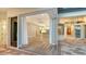 Patio view into the house featuring an open floor plan with a large kitchen and living room at 6914 Dominion Ln, Lakewood Ranch, FL 34202