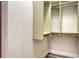 This walk-in closet features custom shelving and rods for maximum storage capacity at 6914 Dominion Ln, Lakewood Ranch, FL 34202