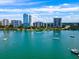 Beautiful aerial view of Essex House offering stunning bay views from a luxury high-rise condominium complex at 707 S Gulfstream Ave # 301, Sarasota, FL 34236