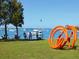 Bay view with boats, public art, and people enjoying the scenery at 707 S Gulfstream Ave # 301, Sarasota, FL 34236