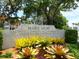 Marie Selby Botanical Gardens entrance with vibrant flora and lush greenery landscape design at 707 S Gulfstream Ave # 301, Sarasota, FL 34236