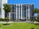 Exterior shot of Essex House featuring lush landscaping and a well-maintained facade at 707 S Gulfstream Ave # 301, Sarasota, FL 34236