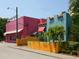 Eye-catching building with vibrant colors, including pink and blue facades at 707 S Gulfstream Ave # 301, Sarasota, FL 34236