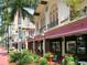 Upscale commercial street with beautiful storefronts and manicured flower beds at 707 S Gulfstream Ave # 301, Sarasota, FL 34236