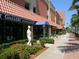 Commercial storefront with sculpture and beautiful tile roof at 707 S Gulfstream Ave # 301, Sarasota, FL 34236