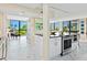 Bright living room with floor-to-ceiling windows offering panoramic views and an open layout at 707 S Gulfstream Ave # 301, Sarasota, FL 34236