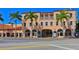 Historic Sarasota Opera House featuring unique architecture, arched windows, and prominent signage at 707 S Gulfstream Ave # 301, Sarasota, FL 34236