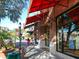 Inviting retail storefront with bright awnings and brick facade at 707 S Gulfstream Ave # 301, Sarasota, FL 34236