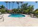 Inviting community pool with ample seating and a serene atmosphere at 7331 Villa D Este Dr, Sarasota, FL 34238