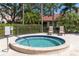 Community hot tub area with lounge chairs at 7331 Villa D Este Dr, Sarasota, FL 34238