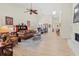 A spacious living room with an open layout, including sofas, dining area, and views to other living spaces at 7331 Villa D Este Dr, Sarasota, FL 34238