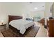 Main bedroom with vaulted ceilings, skylight, and natural light at 7331 Villa D Este Dr, Sarasota, FL 34238