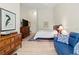 Spacious main bedroom featuring a king bed, sitting area, and luxury finishes at 7331 Villa D Este Dr, Sarasota, FL 34238