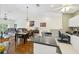 Spacious kitchen featuring an island, ample cabinet space, and black countertops at 7532 Marsh Orchid Cir # 8-201, Bradenton, FL 34203