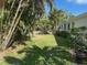 Well-maintained backyard with lush greenery and ample space to relax at 754 Spanish S Dr # 754, Longboat Key, FL 34228