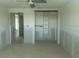 Unfinished bedroom featuring a built-in closet and an open layout, ready for customization at 754 Spanish S Dr # 754, Longboat Key, FL 34228