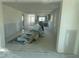 Spacious living room awaiting personalization, featuring ample natural light and an open floor plan at 754 Spanish S Dr # 754, Longboat Key, FL 34228