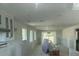 Bright and airy living room with recessed lighting and large windows offering scenic views at 754 Spanish S Dr # 754, Longboat Key, FL 34228