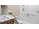 Neutral bathroom featuring glass shower doors and tile flooring at 8272 Summer Night Rd, Sarasota, FL 34241
