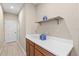 Butlers pantry featuring shelving and ample counter space at 8272 Summer Night Rd, Sarasota, FL 34241