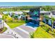 Stunning exterior of the modern clubhouse featuring lush landscaping, sleek design, and inviting entrance at 8272 Summer Night Rd, Sarasota, FL 34241