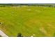 Expansive green sports field with soccer goals, perfect for outdoor activities and community events at 8272 Summer Night Rd, Sarasota, FL 34241