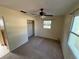 Bedroom with ceiling fan, closet and natural light at 8291 57Th N St, Pinellas Park, FL 33781