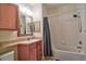 Full bathroom featuring a vanity, mirror, and bathtub with shower at 8341 38Th Street Cir E # 303, Sarasota, FL 34243
