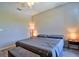 Spacious bedroom features a ceiling fan and natural light, creating a relaxing atmosphere at 8341 38Th Street Cir E # 303, Sarasota, FL 34243