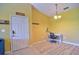 Inviting entryway with a bright office nook featuring a modern desk and chair at 8341 38Th Street Cir E # 303, Sarasota, FL 34243