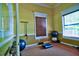 Dedicated exercise room with equipment and natural light at 8341 38Th Street Cir E # 303, Sarasota, FL 34243