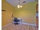 Light-filled office nook with a modern desk and chair in a stylish condo at 8341 38Th Street Cir E # 303, Sarasota, FL 34243